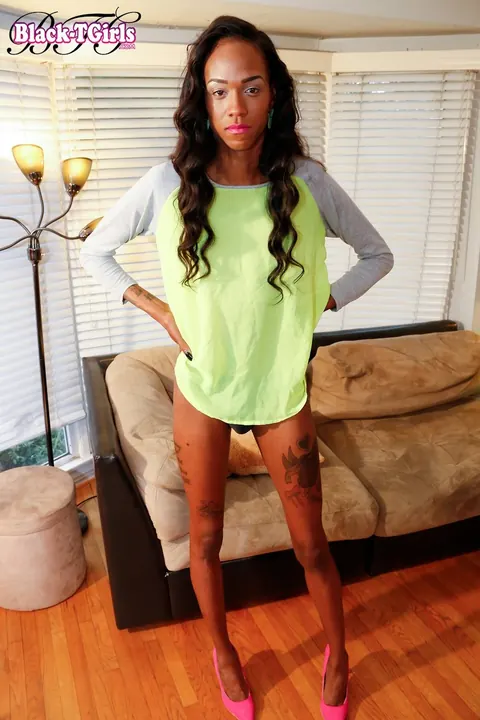 Ebony Trans Woman Strips Nude and Flaunts Her Cock and Curves – photo 2 of 16