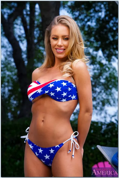 Nicole Aniston: Thick Blonde Peels Off Her Bikini and Spreads by the Pool – photo 1 of 16