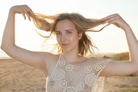 Blonde Beauty Poses Nude on a Sandy Beach – photo 1 of 16