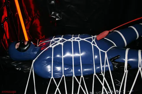 Blonde in Latex Lingerie and Heels Dominates Tied Man – photo 14 of 16