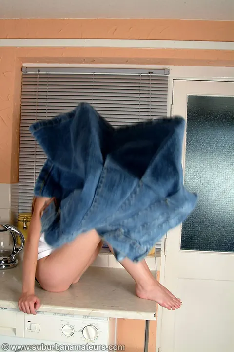 Petite British Woman Strips Off Her Skirt and Spreads in the Kitchen – photo 15 of 21