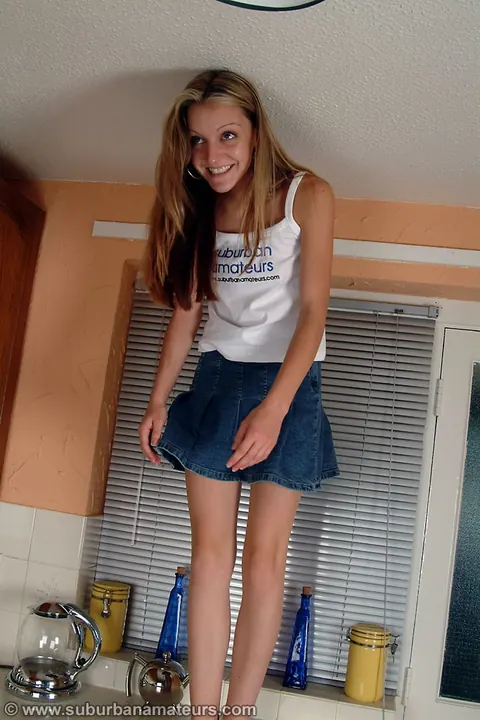 Petite British Woman Strips Off Her Skirt and Spreads in the Kitchen – photo 3 of 21