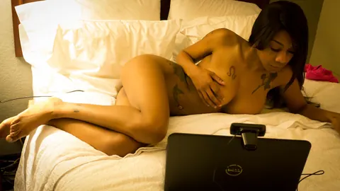 Ebony Brunette with Big Tits Spreads Her Shaved Pussy on the Bed – photo 1 of 15