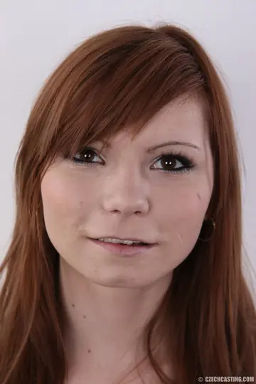 European Redhead Removes Her Lingerie and Spreads Her Hairy Pussy