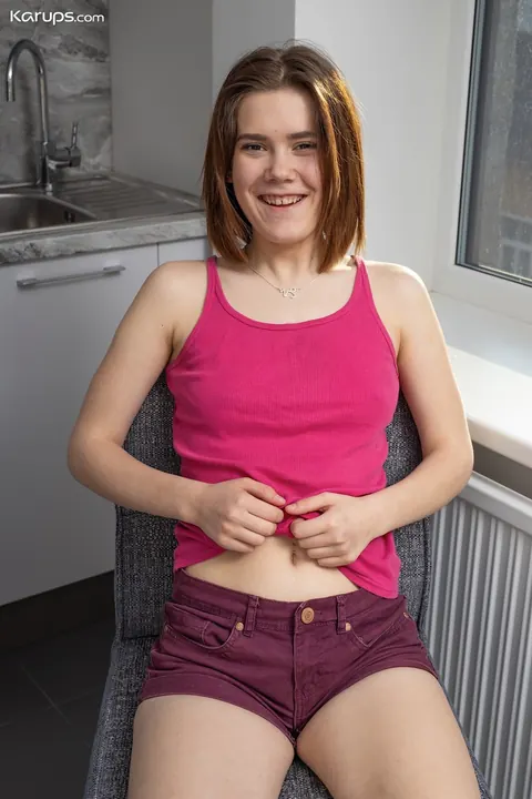 European Woman Undresses and Poses Nude in the Kitchen – photo 2 of 21