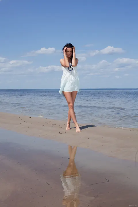 Woman Undresses and Spreads Her Legs on the Beach – photo 1 of 21