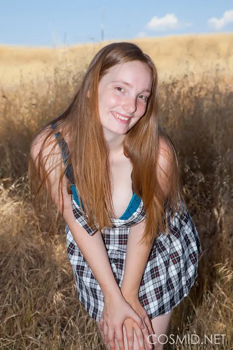 Julia Fleming: Tall Redhead Strips Out of Her Skirt and Panties in the Forest – photo 3 of 16