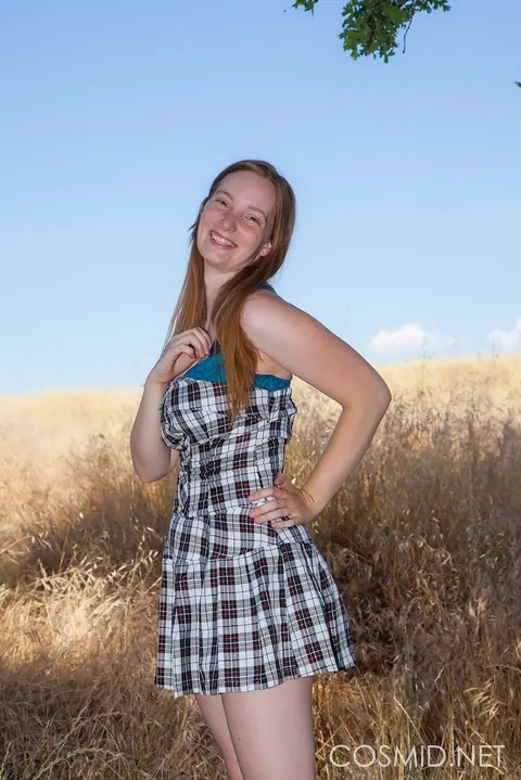 Julia Fleming: Tall Redhead Strips Out of Her Skirt and Panties in the Forest – photo 2 of 16