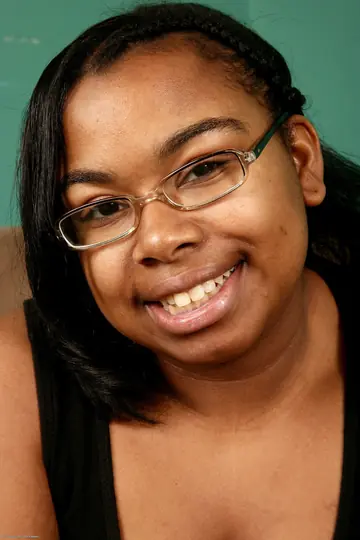 Ebony BBW Poses Nude in Her Glasses