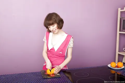 Pale Short-Haired Woman Undresses and Spreads in the Kitchen – photo 4 of 16