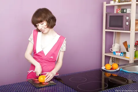 Pale Short-Haired Woman Undresses and Spreads in the Kitchen – photo 3 of 16