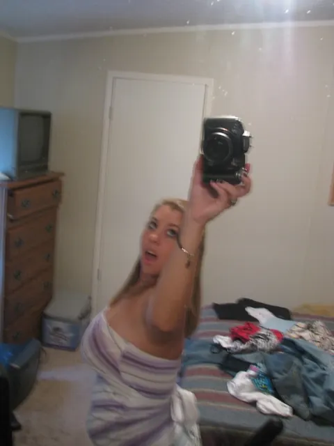 Tanned Amateur Shows Off Her Big Tits in Phone Selfies – photo 10 of 20