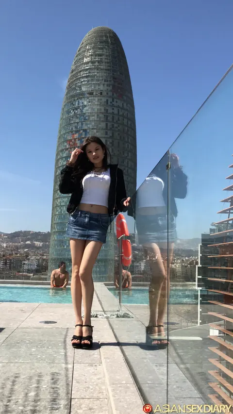 Slim Asian Blonde with Big Tits Poses by a Pool – photo 10 of 21