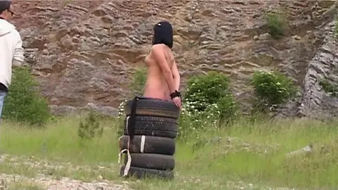 Roxyn: Brunette MILF Strips Outdoors in Bondage and Spreads Her Legs – photo 7 of 17