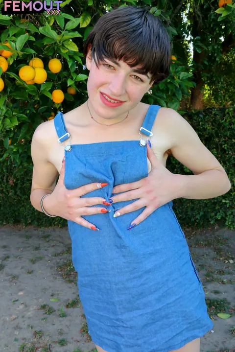 Trans Woman with Small Tits Stands Nude Outdoors in Sunlight – photo 1 of 16