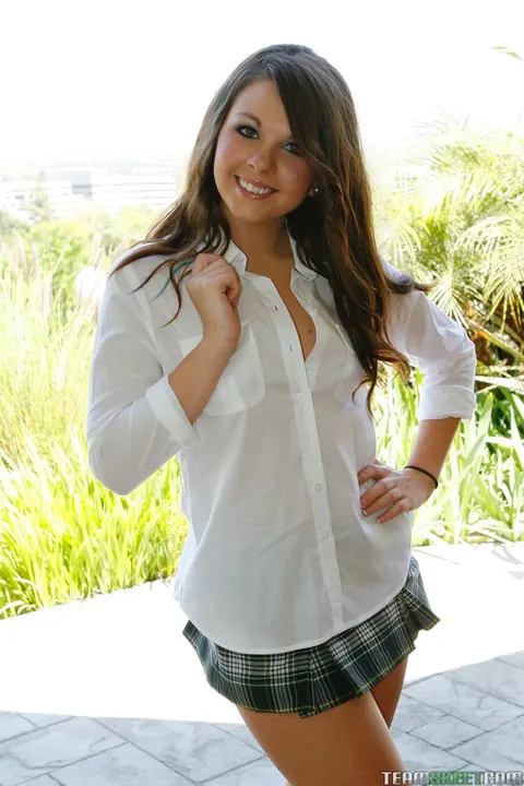 Cali Hayes: Brunette in Uniform Lifts Her Hem and Spreads Outdoors – photo 2 of 17