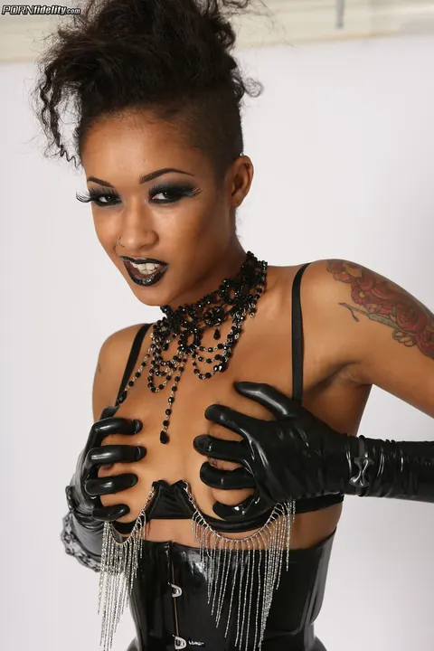 Skin Diamond: Ebony Brunette Strips Out of Her Leather Uniform and Stockings – photo 9 of 19