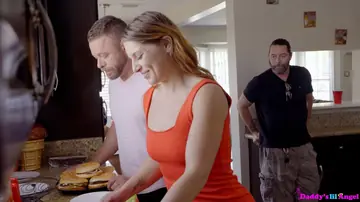 Brunette in a Skirt Takes a Creampie in a Kitchen Threesome