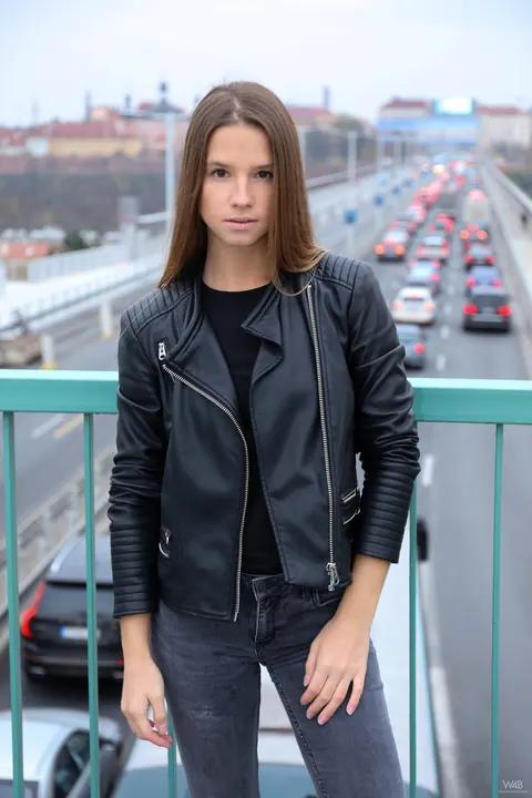 Vanessa Mio: Woman in Leather Boots and Jeans Strips Outdoors – photo 7 of 20