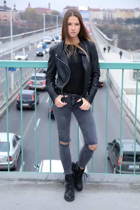 Vanessa Mio: Woman in Leather Boots and Jeans Strips Outdoors – photo 6 of 20