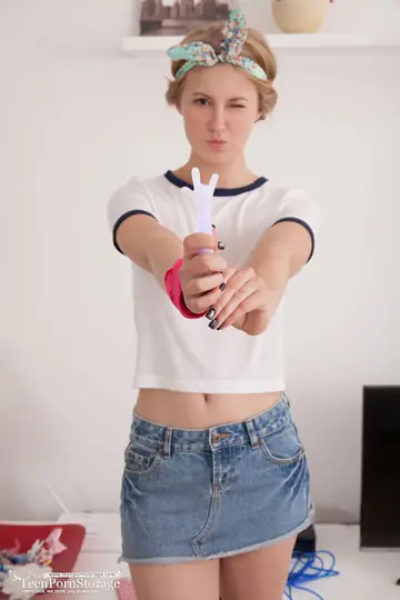 European Blonde Lifts Her Skirt and Spreads Her Pussy in Socks