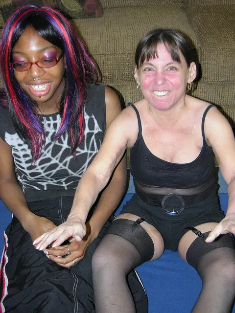 Redhead MILF and Ebony Babe Use a Banana in Lesbian Play – photo 2 of 21