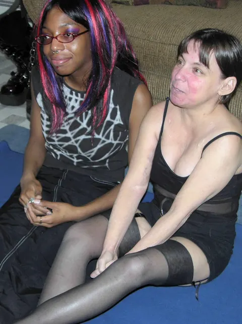 Redhead MILF and Ebony Babe Use a Banana in Lesbian Play – photo 1 of 21