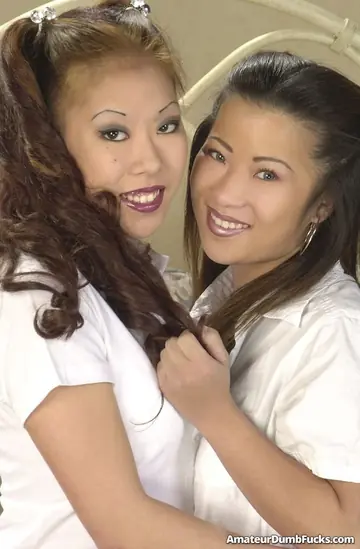 Ayako Tamura – Curly-Haired Asian Women Strip in Uniforms for Strap-On Sex