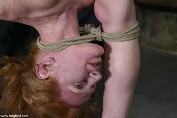 Mature Redhead Hogtied and Spreads Her Pussy