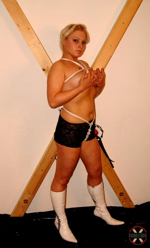 Blonde in Leather Lingerie and High Heels Spreads While Tied – photo 13 of 16