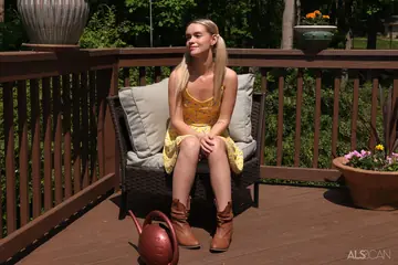 Blonde Strips Out of Her Skirt and Uses a Dildo on the Balcony