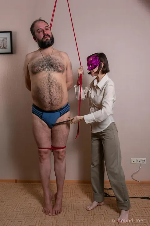 Brunette Dominatrix Kisses Her Bound Partner – photo 10 of 16