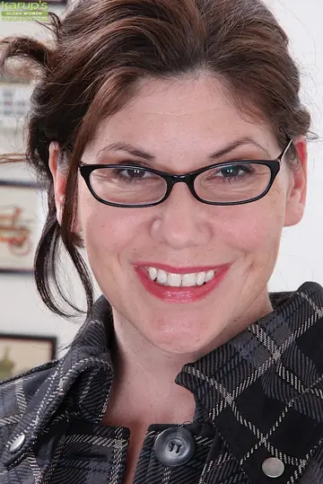 Mature Woman in a Skirt and Heels Removes Glasses and Spreads