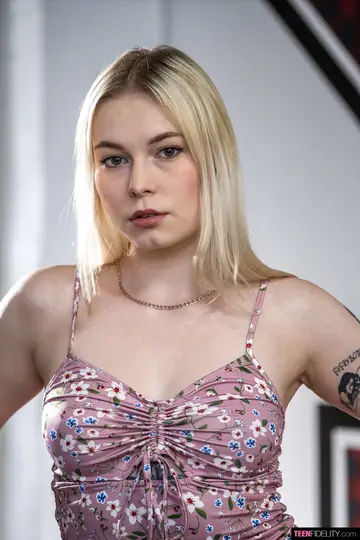 Blonde Strips Out of Her Dress to Reveal Her Inked Body in Lingerie