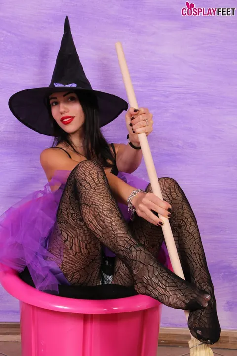 Brunette Witch Poses in Lingerie and Pantyhose – photo 7 of 10