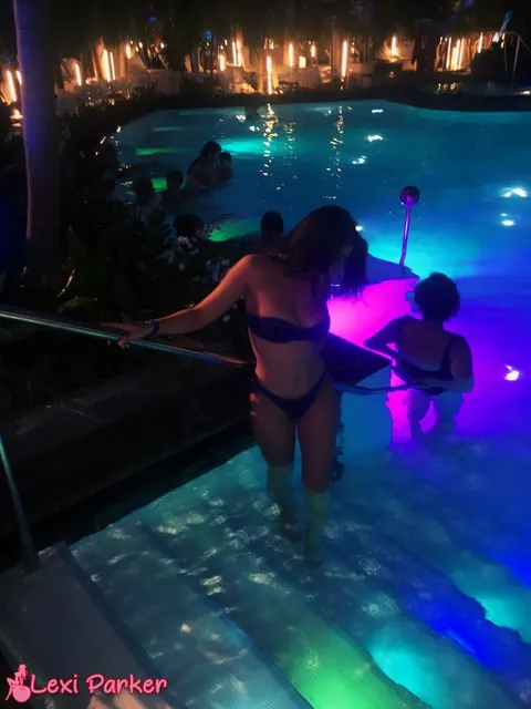 Lexi Parker: Short-Haired Brunette Strips Out of Her Bikini by the Pool – photo 9 of 15