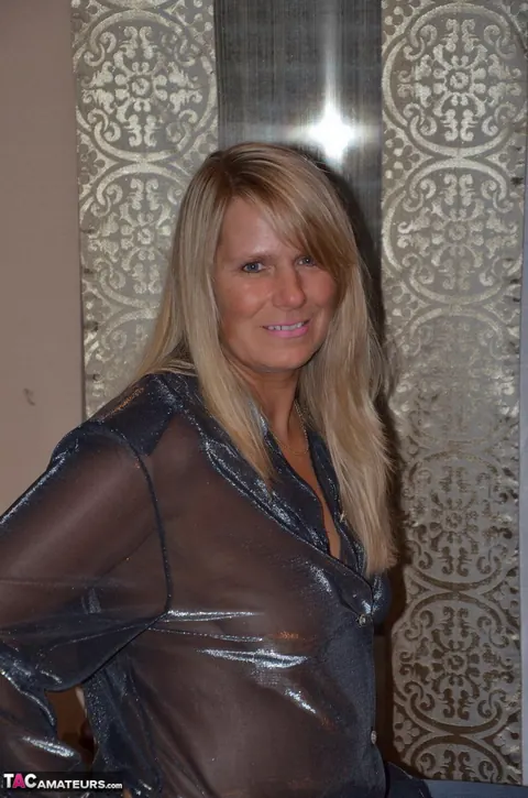 Sweet Susi: European Blonde MILF Unbuttons Her Sheer Blouse and Strips – photo 1 of 16