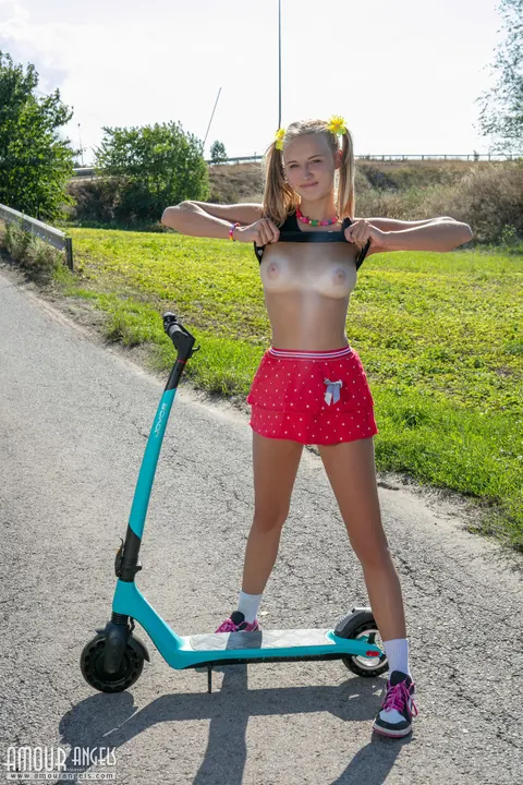 Woman in Pigtails Strips on Her Scooter and Spreads Outdoors – photo 4 of 20