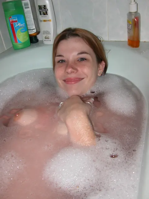 Redhead in the Bathtub Fingers Her Pussy and Spreads Wide – photo 15 of 21