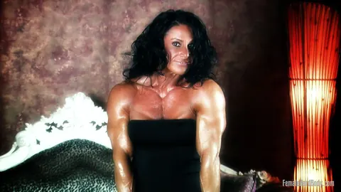 Debbie Bramwell: Thick Brunette MILF Flexes Her Muscles and Big Ass in a Bikini and Dress – photo 2 of 21