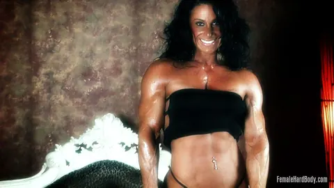 Debbie Bramwell: Thick Brunette MILF Flexes Her Muscles and Big Ass in a Bikini and Dress – photo 18 of 21