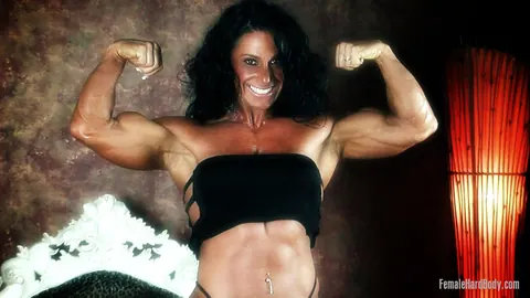 Debbie Bramwell: Thick Brunette MILF Flexes Her Muscles and Big Ass in a Bikini and Dress – photo 13 of 21
