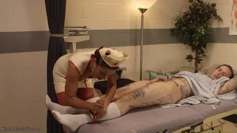 Daisy Ducati: Tall Ebony Redhead Nurse Jerks Off Her Bound Partner – photo 2 of 15