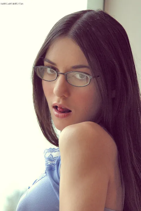 Larisa Fox: Brunette in Glasses Smokes and Lifts Her Shirt – photo 1 of 15
