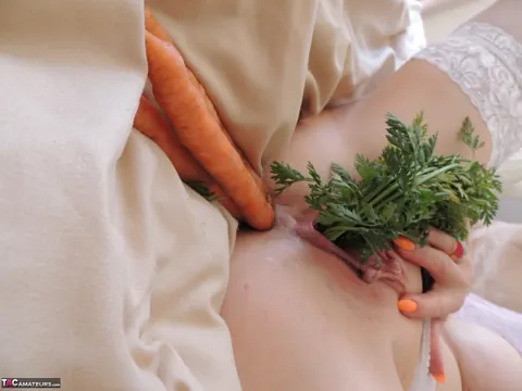 Busty Blonde MILF Penetrates Both Holes with Vegetables – photo 16 of 16