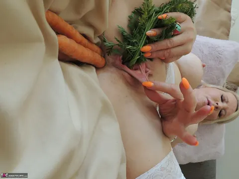Busty Blonde MILF Penetrates Both Holes with Vegetables – photo 3 of 16