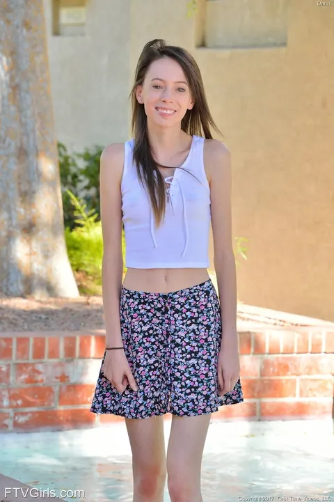 Aria Haze: Petite Brunette in a Skirt Spreads Her Shaved Pussy Outdoors – photo 2 of 20