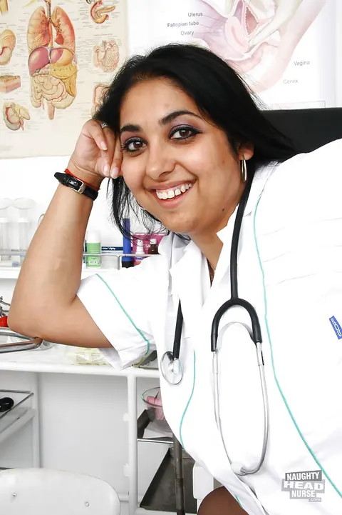Busty Mature Indian Nurse Undresses and Spreads in Uniform – photo 5 of 16