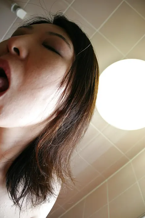 Naho Tajiri: Japanese MILF Gives a Sensual Blowjob in the Bathroom – photo 15 of 16