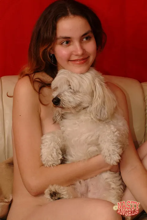 European Redhead Strips Naked on the Sofa Showing Her Trimmed Pussy – photo 15 of 21